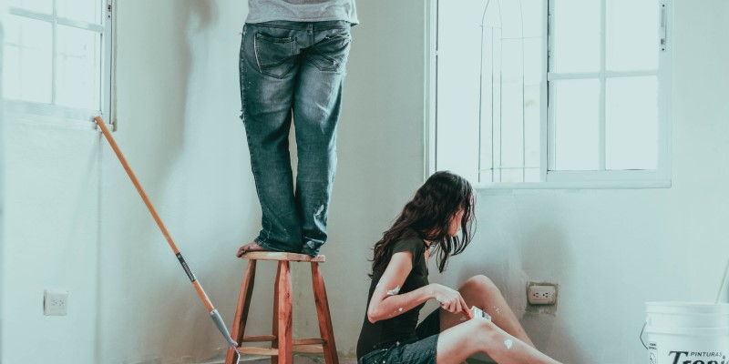 couple painting a room together
