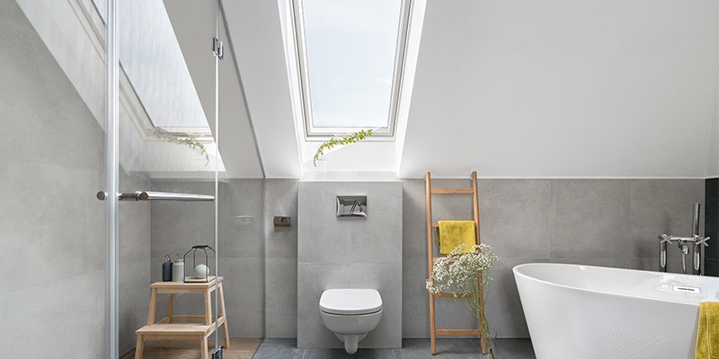 Pitched roof window being used in bathroom