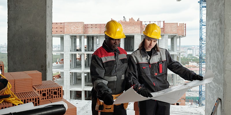 Engineers discussing works to be carried out